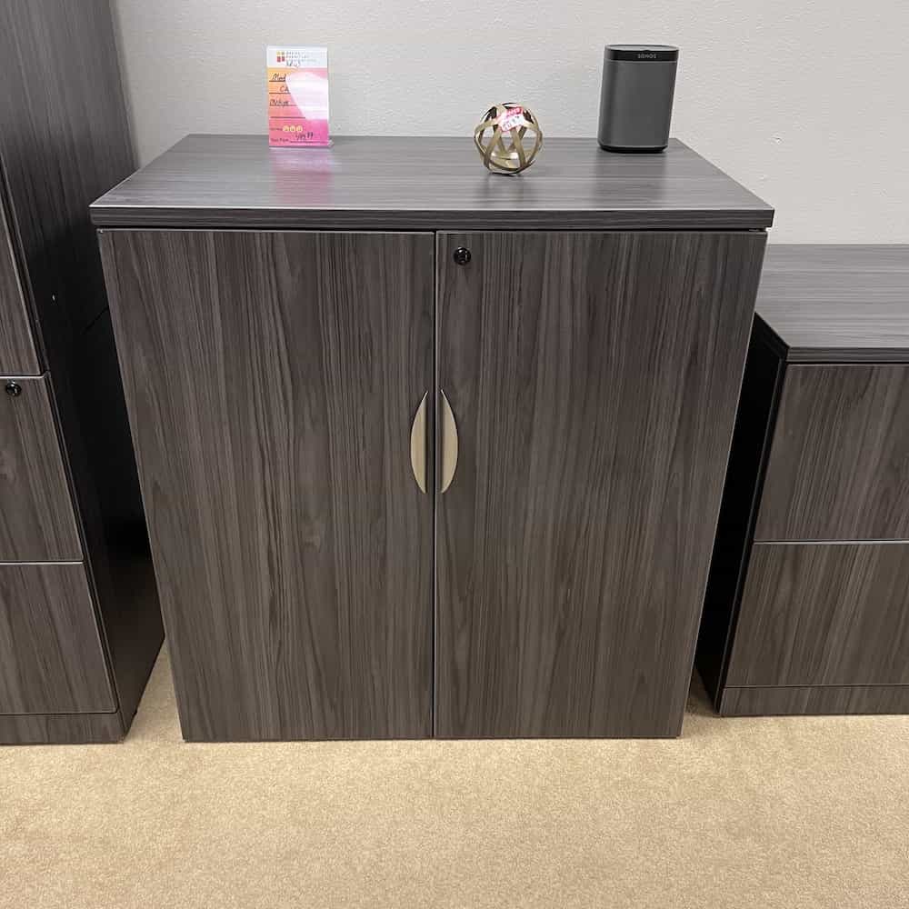 grey storage cabinet with two doors