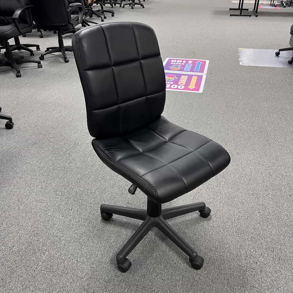 black vinyl quilted task chair armless used Belnick
