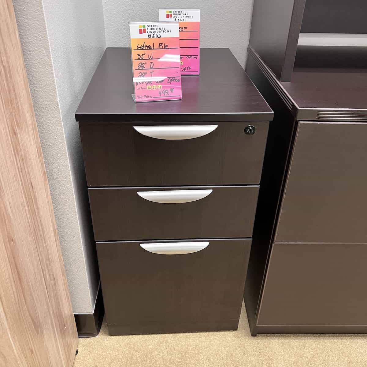 file cabinet with two small drawers on top, and file drawer on bottom