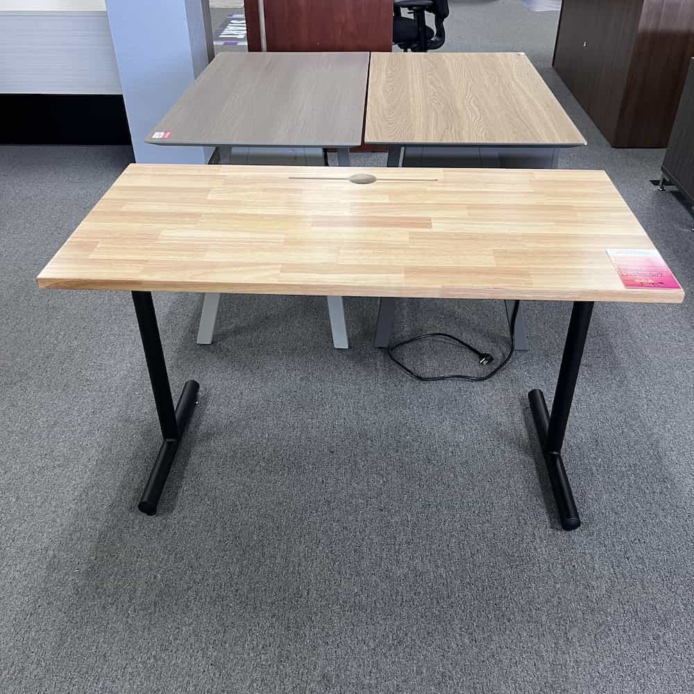 desk with maple top, 1 round cord hole, black T legs on either side