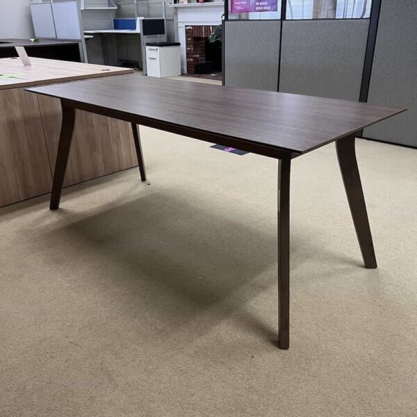walnut laminate table desk with oblique (angles out) legs