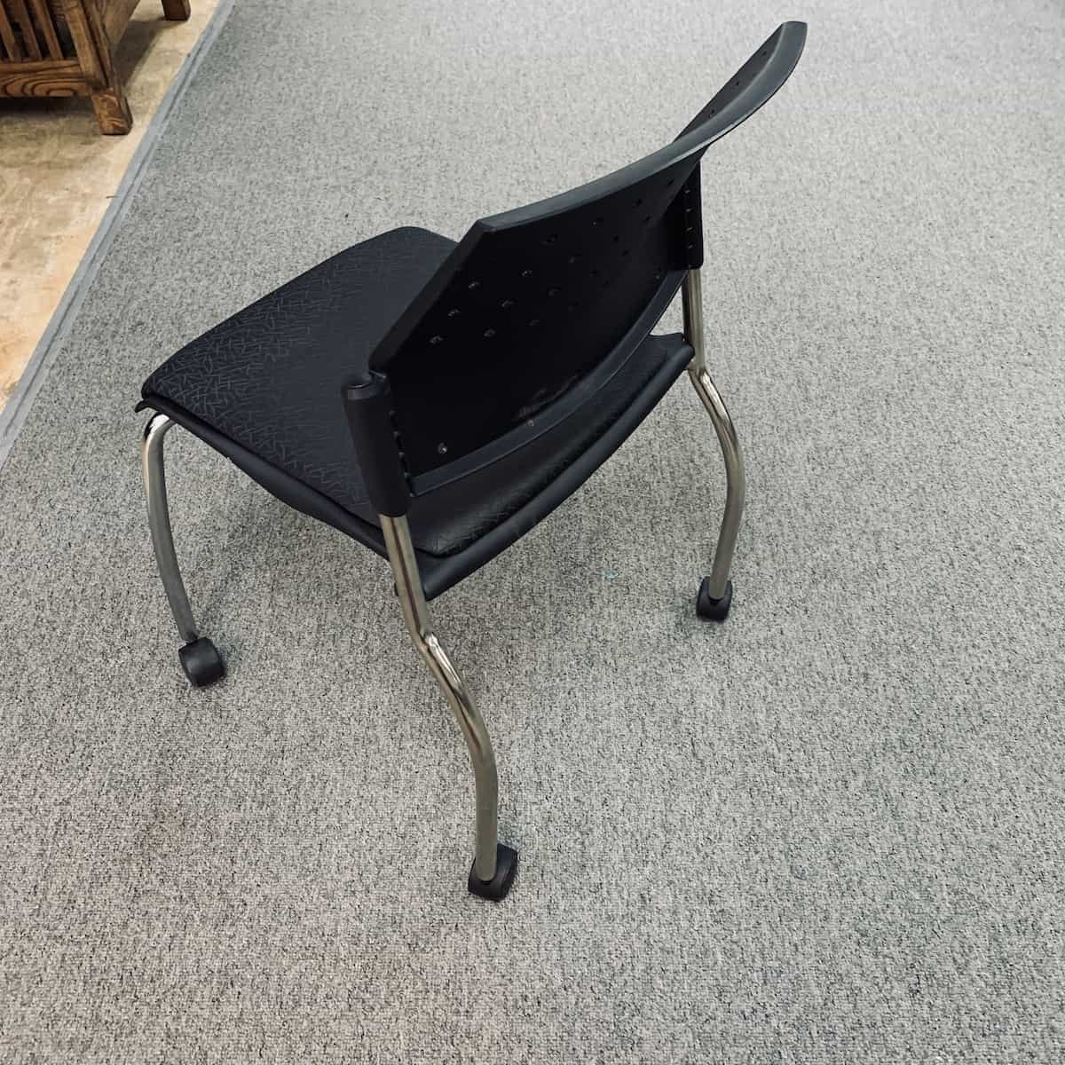Black-silver-stacking-rolling-chair-back