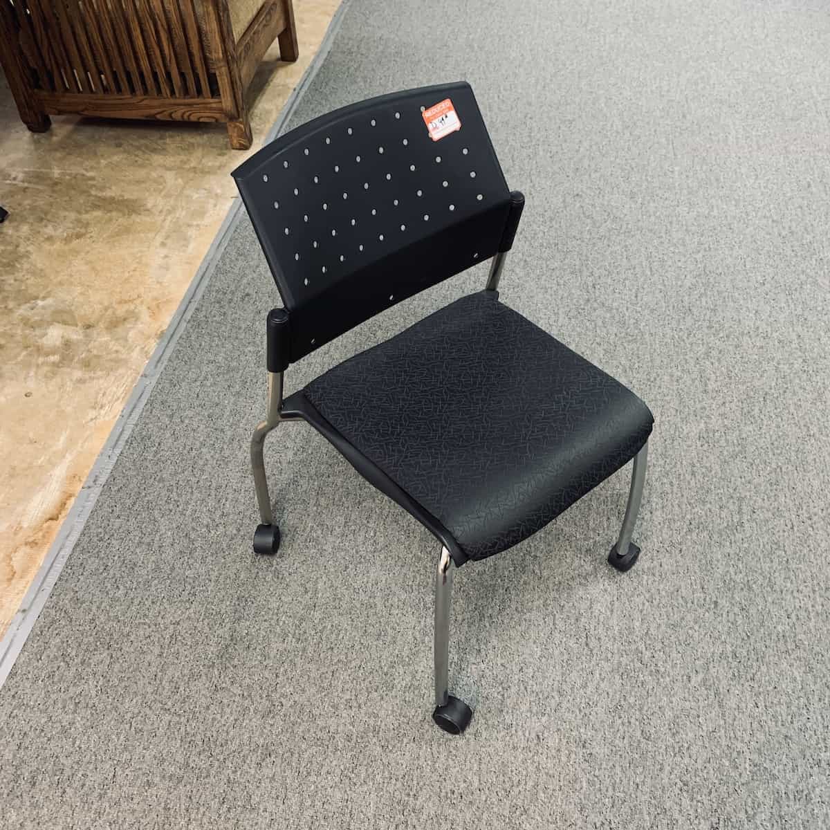 Black-silver-stacking-rolling-chair-front