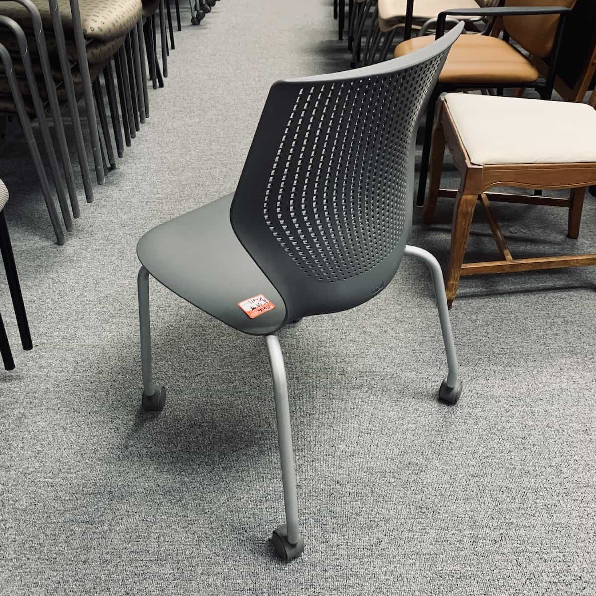 grey-plastic-stacking-chair-wheels-back