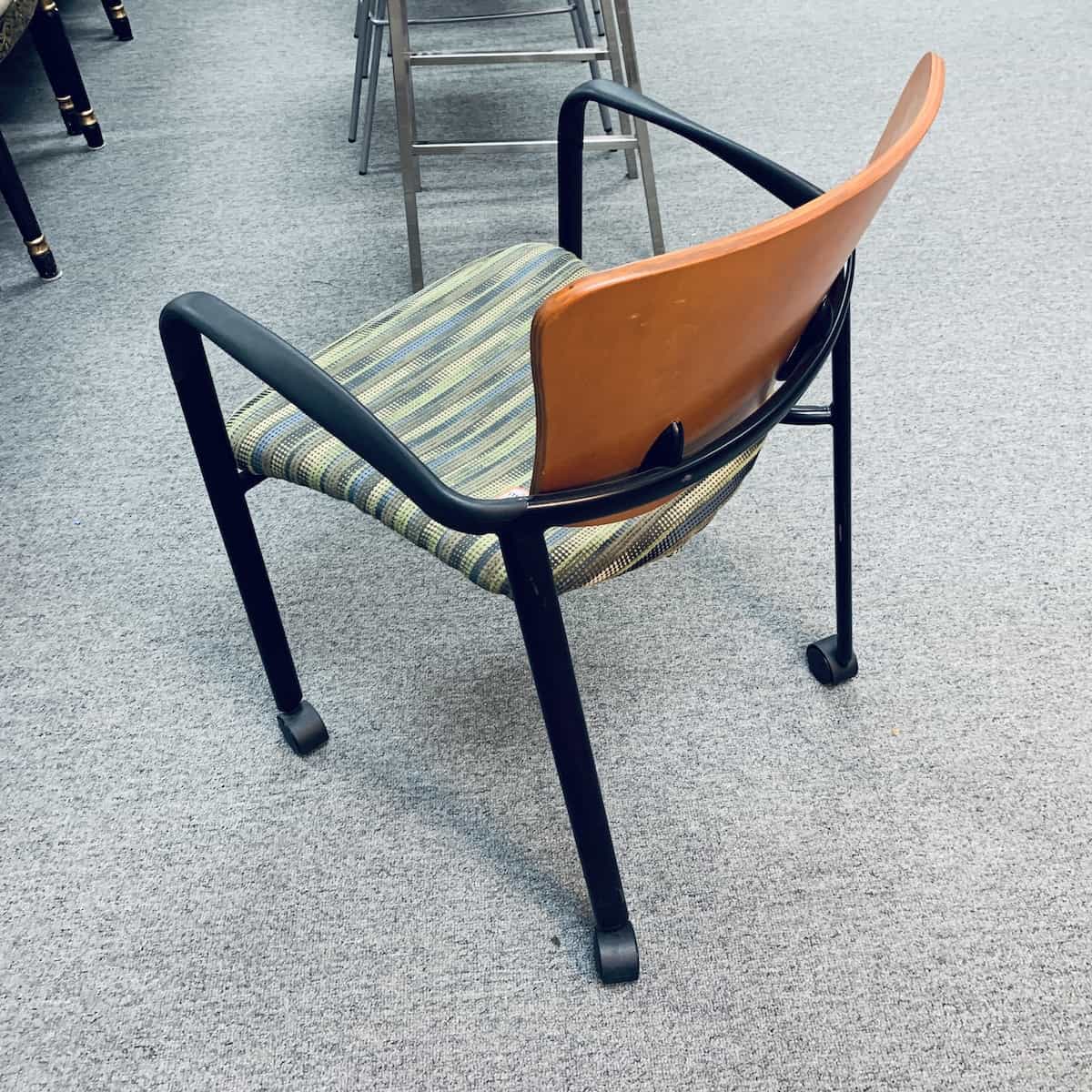honey-green-black-rolling-stacking-chairs-back