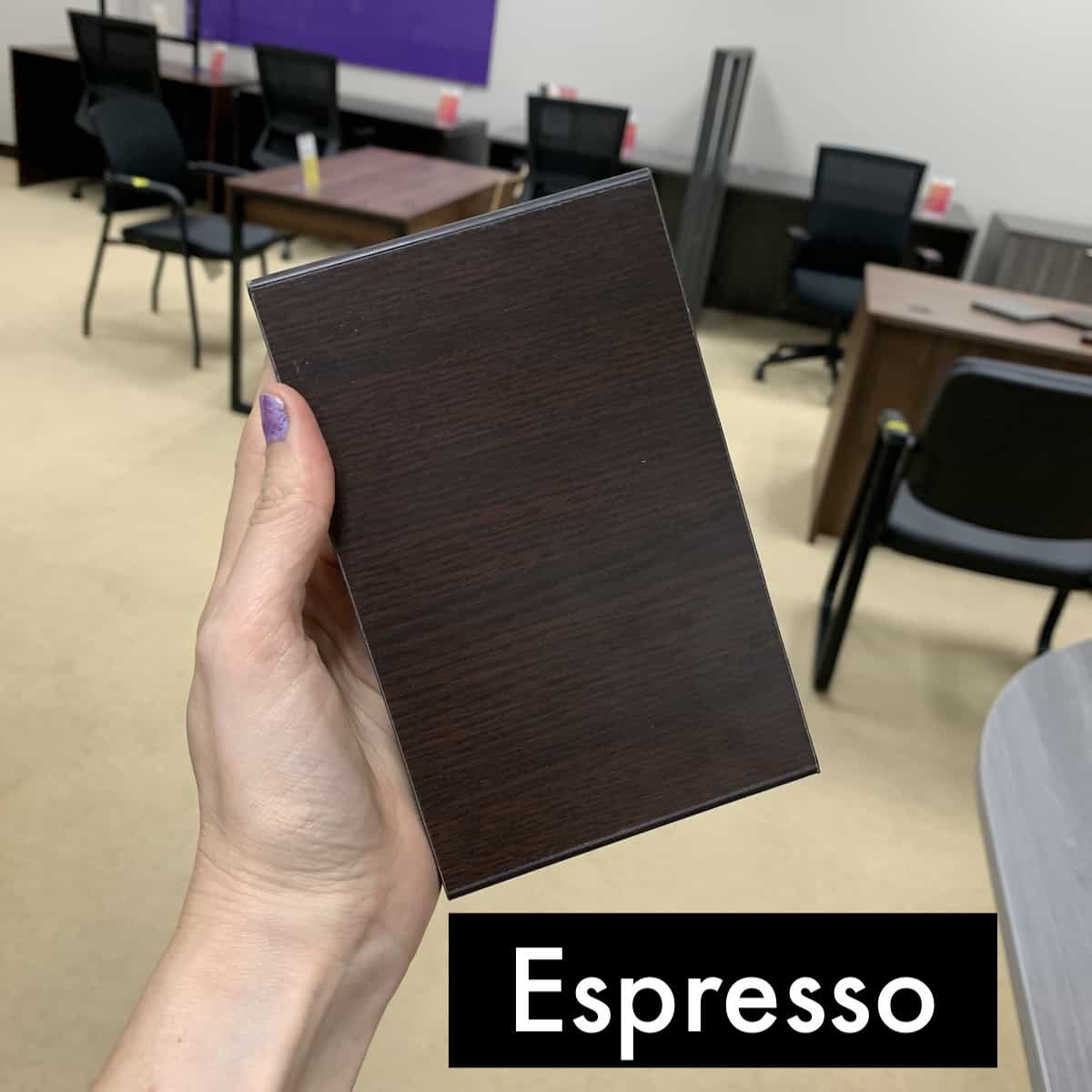 hand holding up an espresso finish block