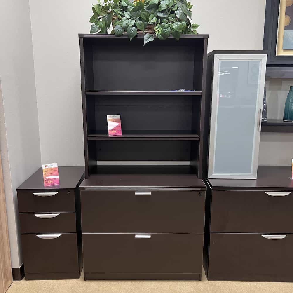 2 drawer lateral with a bookcase hutch on top with two shelves