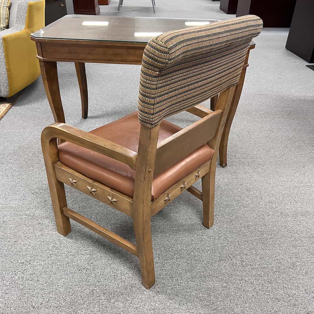 wood chair with top half upholstered, leather light brown seat, 3 stars on each side-back