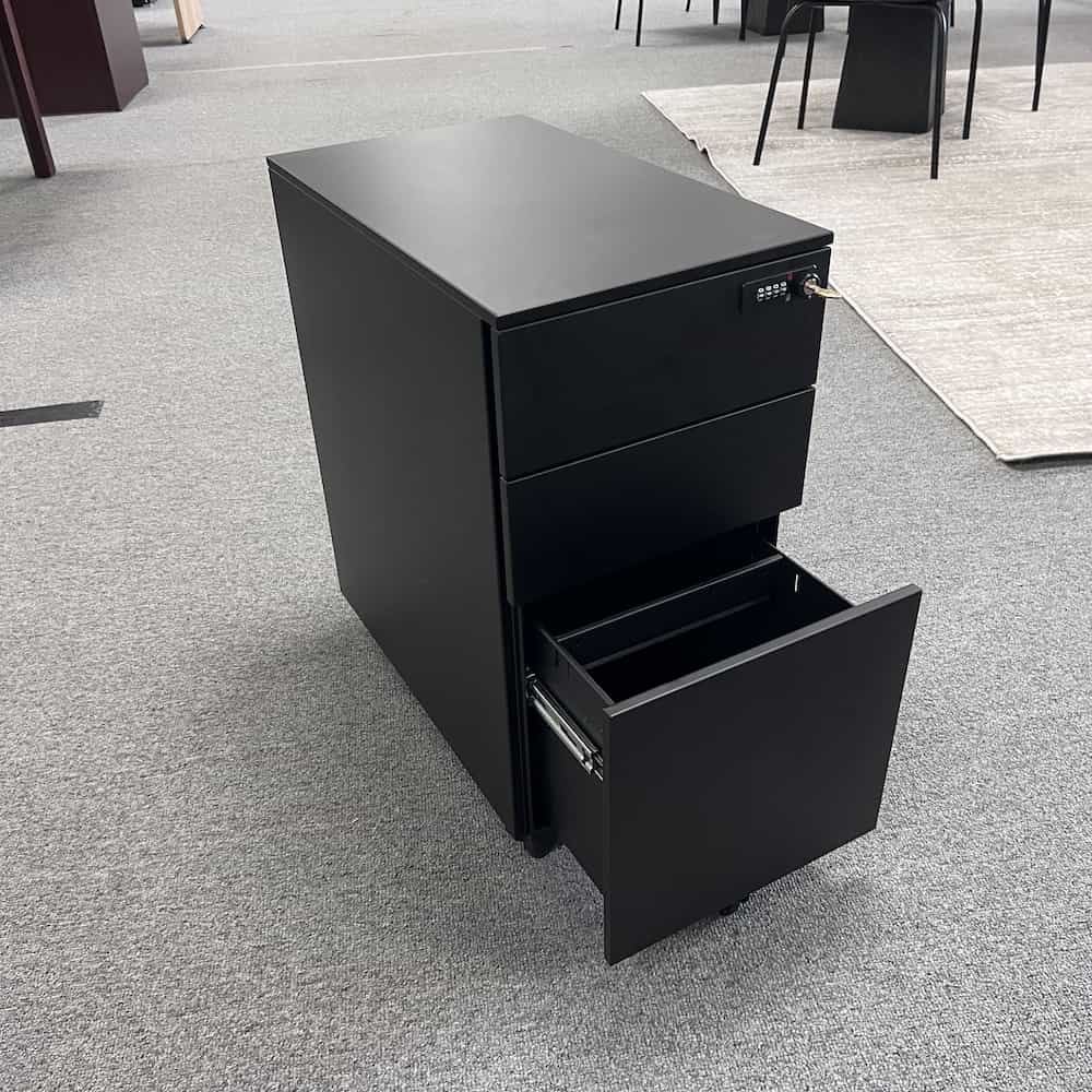 black metal rolling file cabinet with 3 drawers, open file drawer