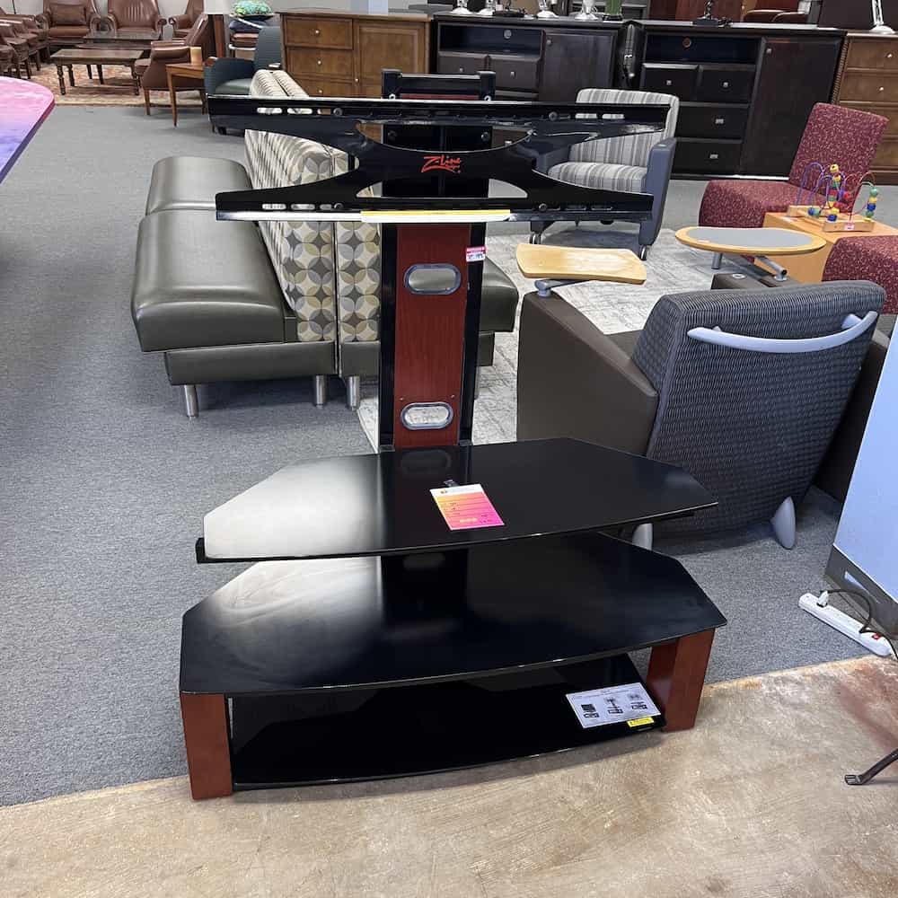 black tv console with tv mount and two shelves, front side