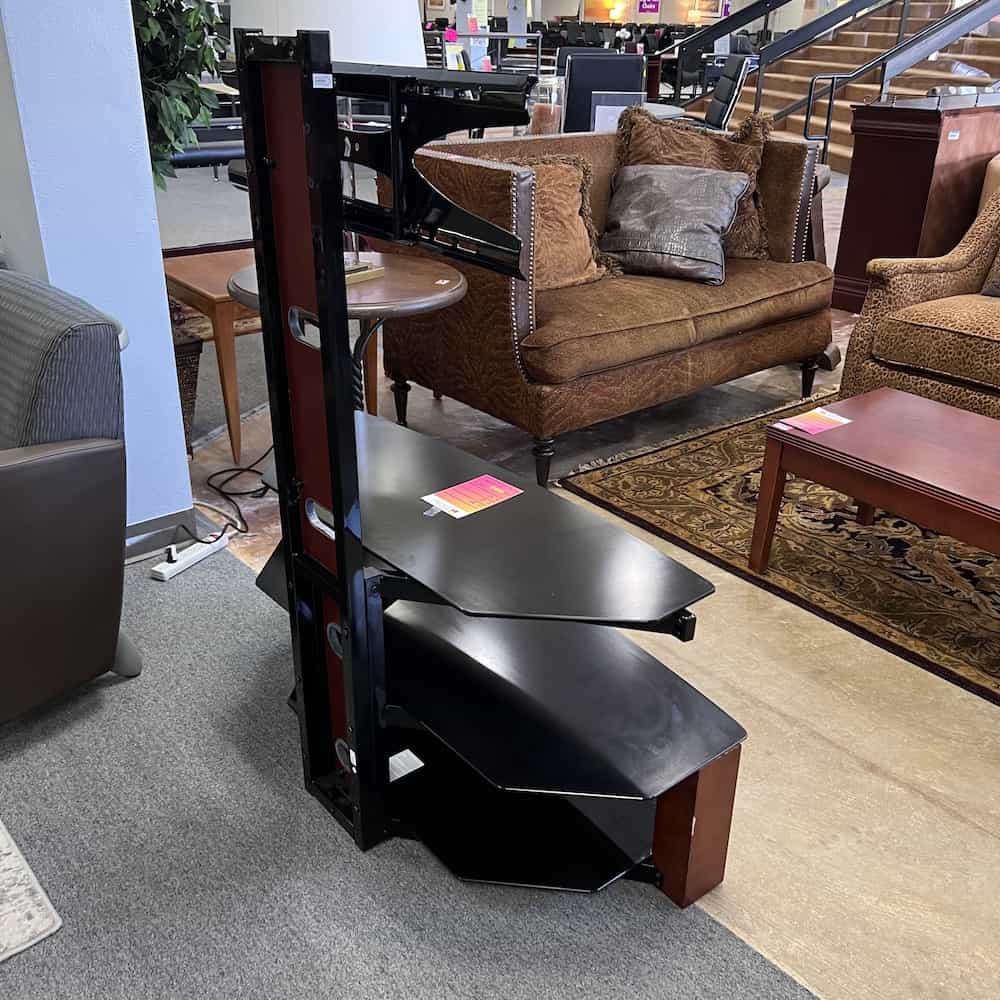 black tv console with tv mount and two shelves