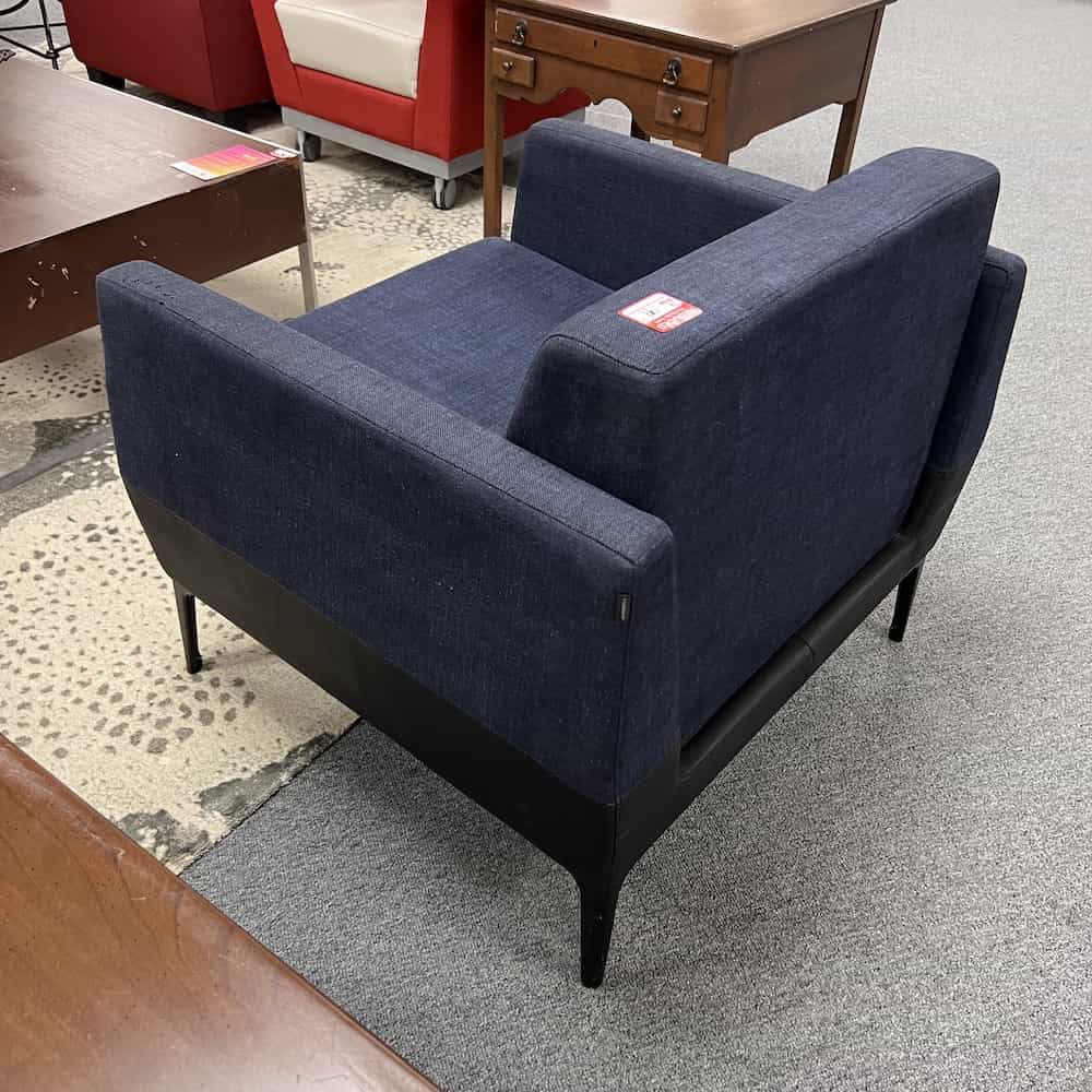 blue top half, black bottom quarter, peg legs, square boxy, back view