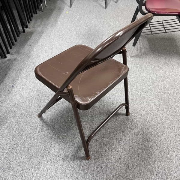 brown painted folding metal chair back