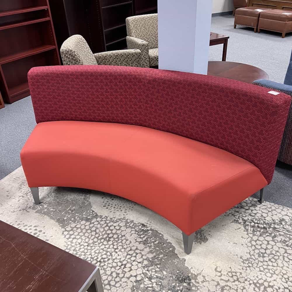curved bench with back, bright red on seat, dark red on back, silver tapered legs