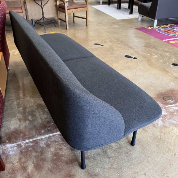 vari modern sofa bench rounded edges, grey heather upholstery, peg legs, side view