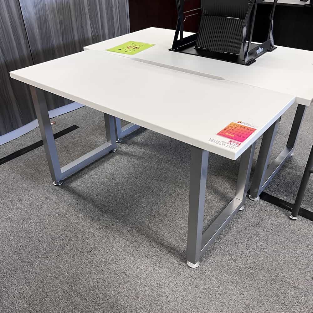 table desk with square silver leg structure and a 1 inch thick laminate top
