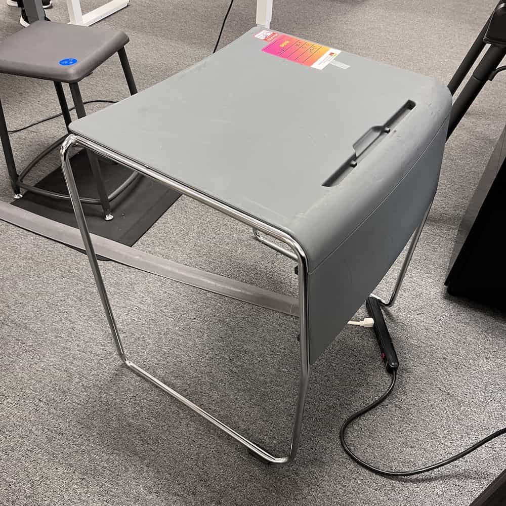 small grey desk with wire frame, side