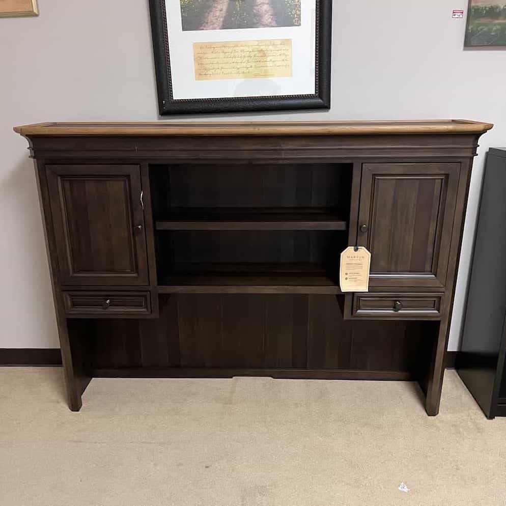 Executive Storage Credenza, 4 drawers, 2 cabinets with doors, honey and black, shown with two bookcases in a room