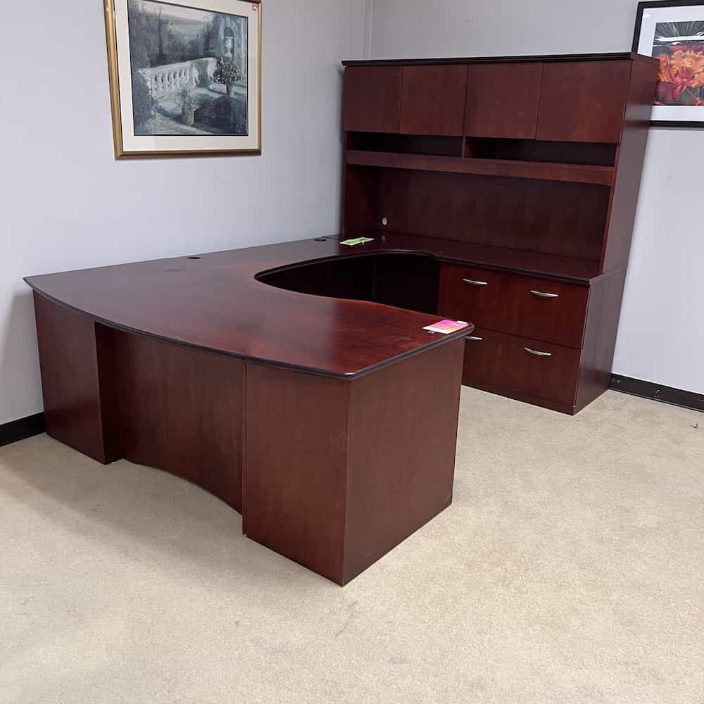 mahogany u-desk with black edging
