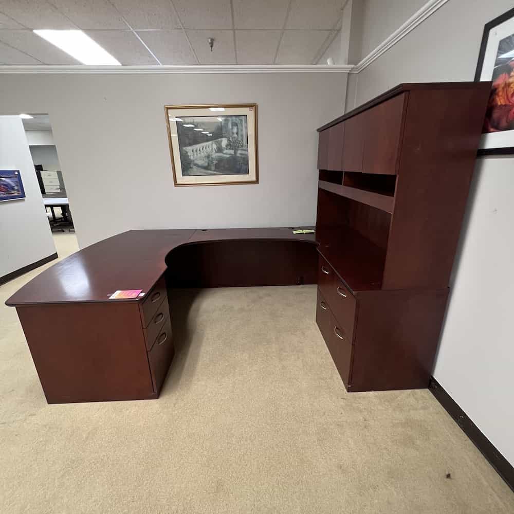 mahogany u-desk with black edging, side view