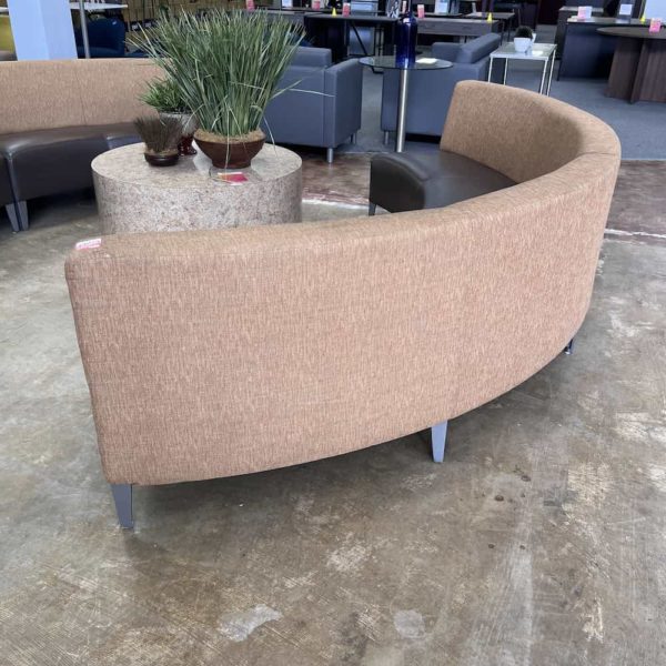 two piece coalesse round couch in taupe and tan, two half circles