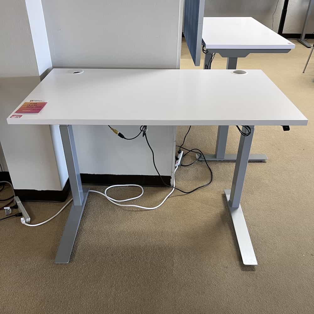 white height adjustable desk, fully