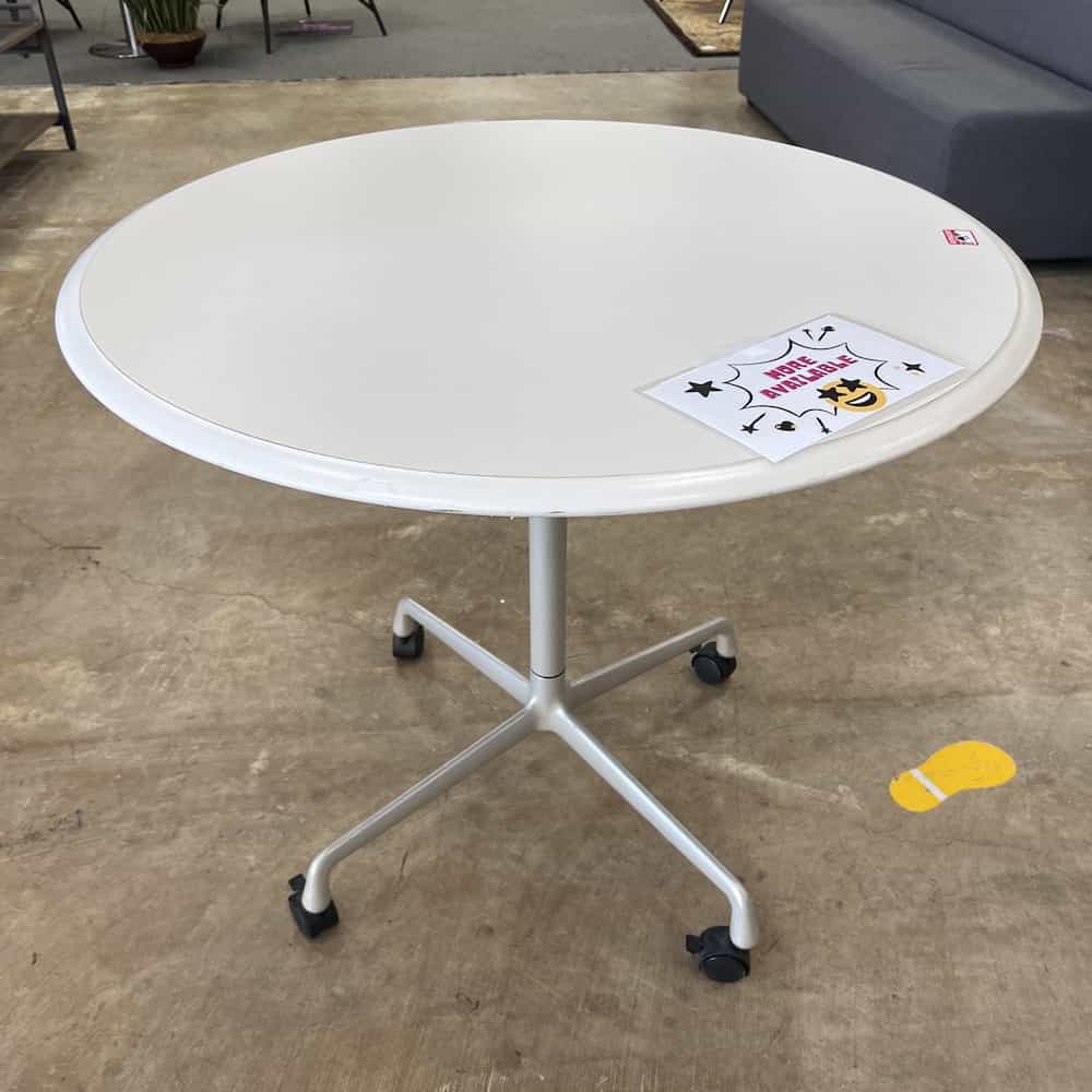 white round, rolling table, silver base