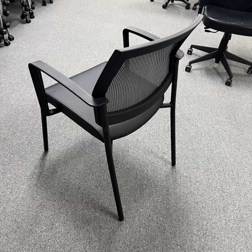 black stacking chair with mesh back