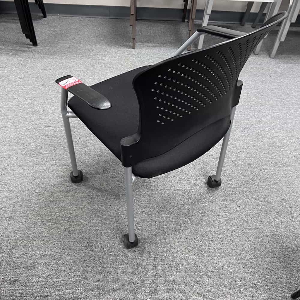 black rolling stacking chair