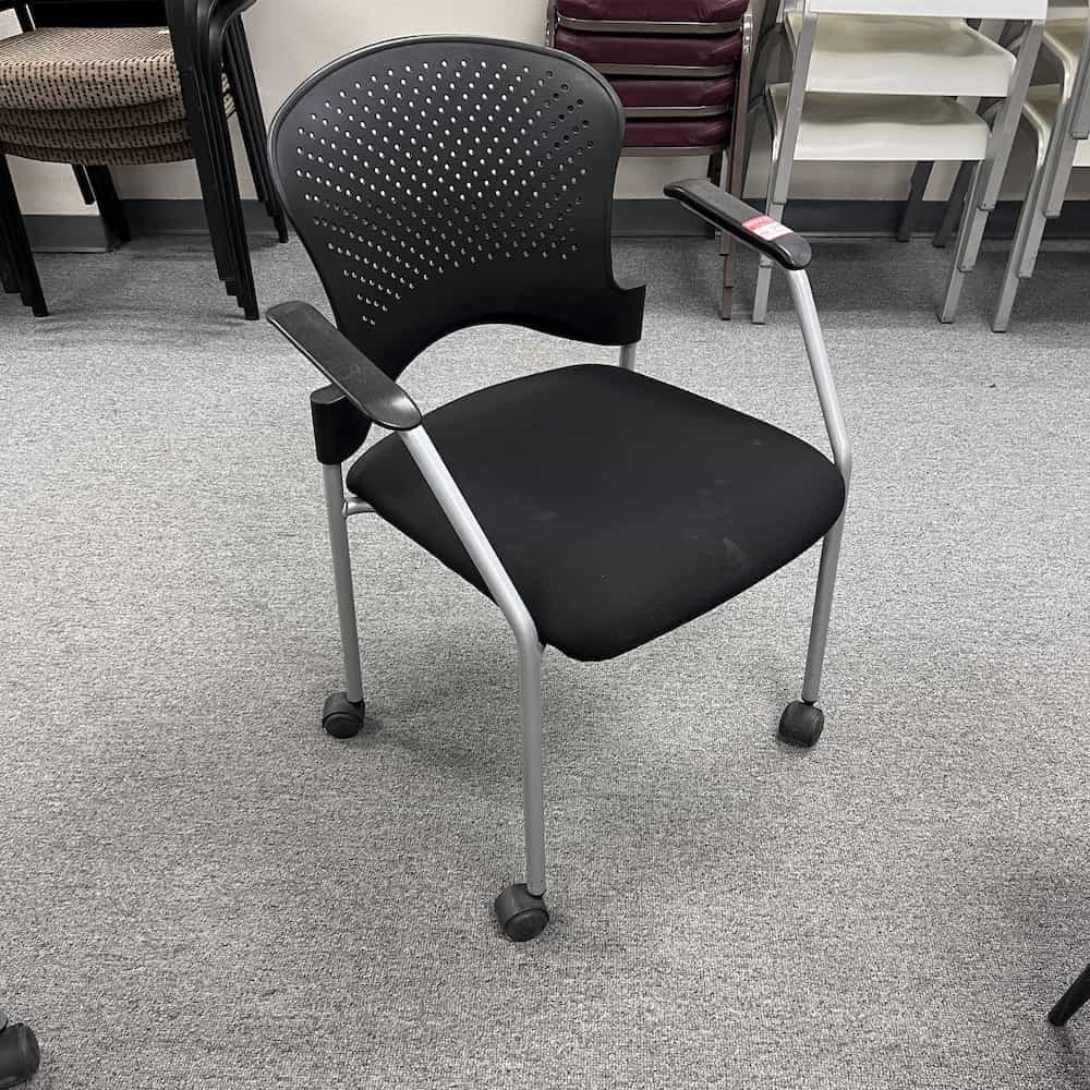 black rolling stacking chair