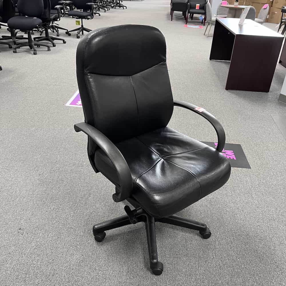 black vinyl chair, conference with fixed arms and plush look