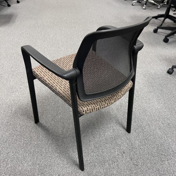 tan mesh back stacking chair mesh back