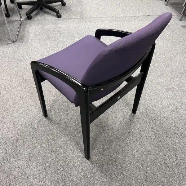 purple guest chair with black arms