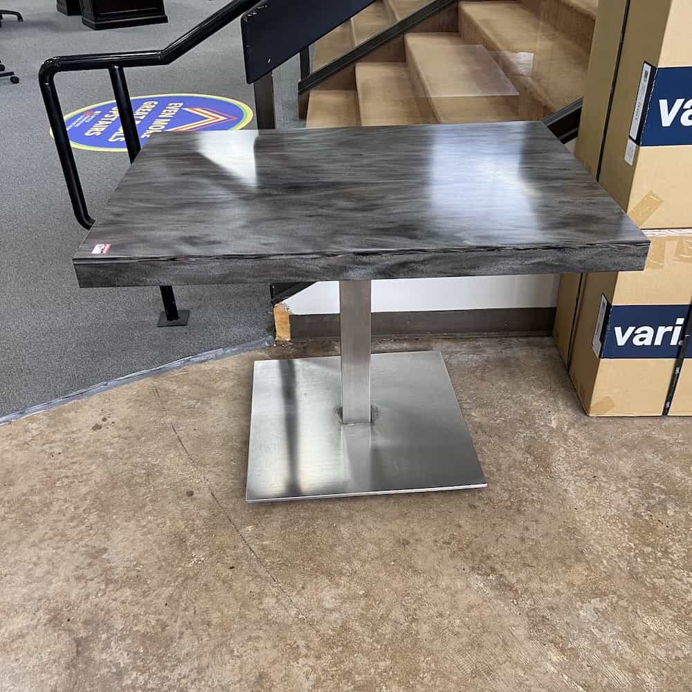 grey, rectangle table with silver square base Restaurant Table