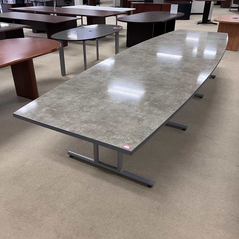 grey boat shaped conference table