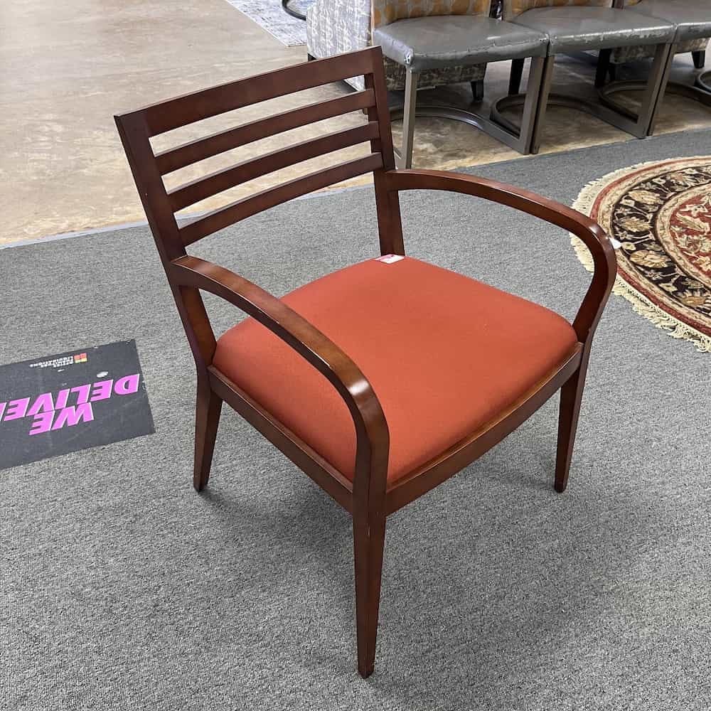 red guest chair with cherry veneer