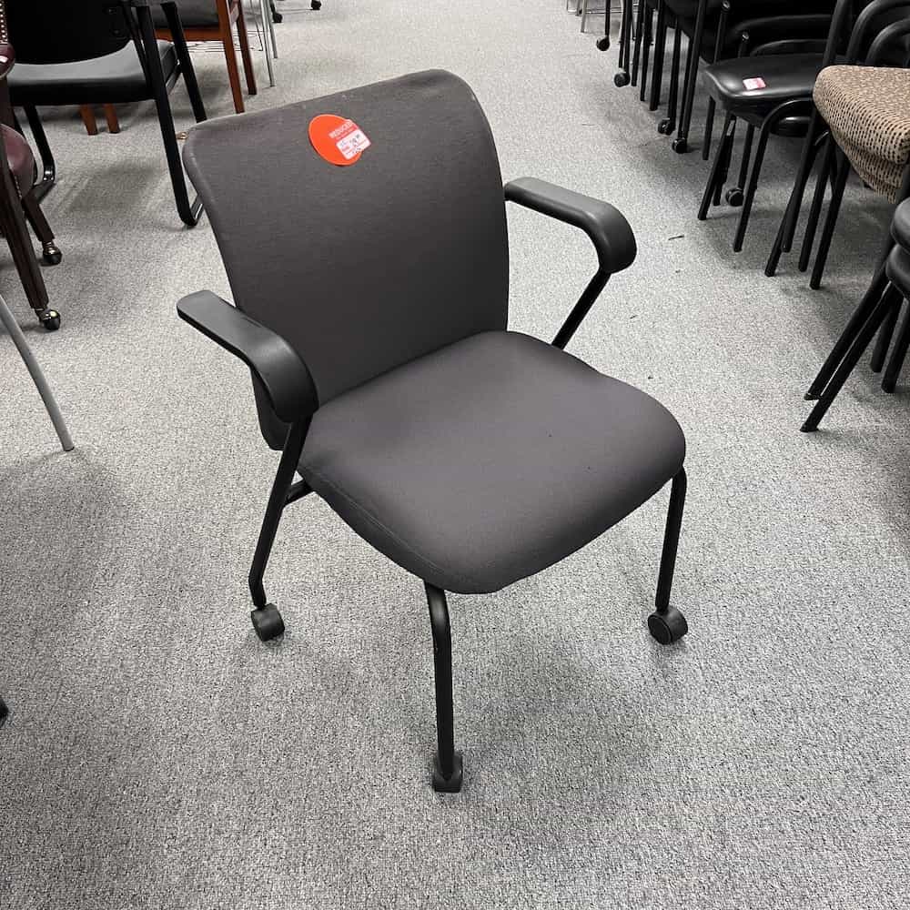 dark grey mesh back rolling stacking chair