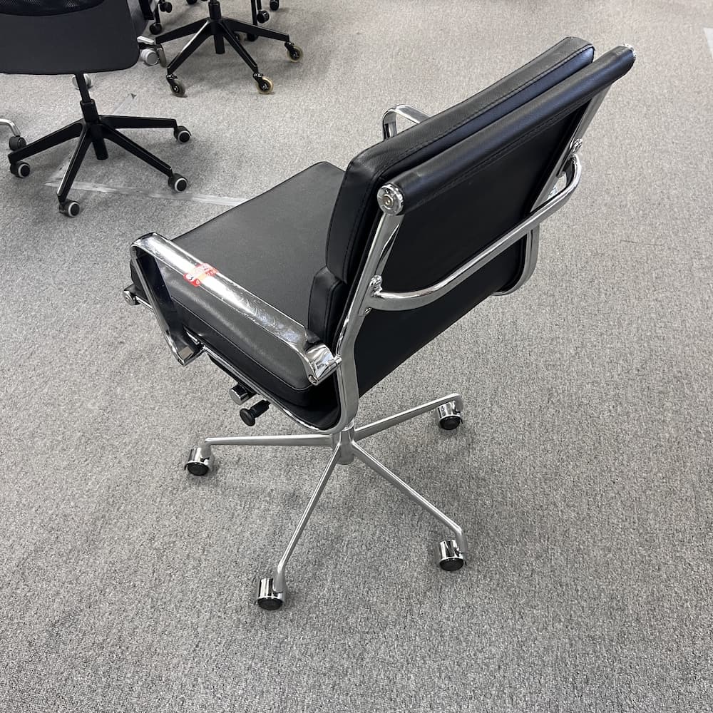 black padded vinyl with chrome base conference chair, used office furniture
