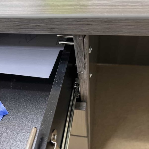 damage on desk, grey