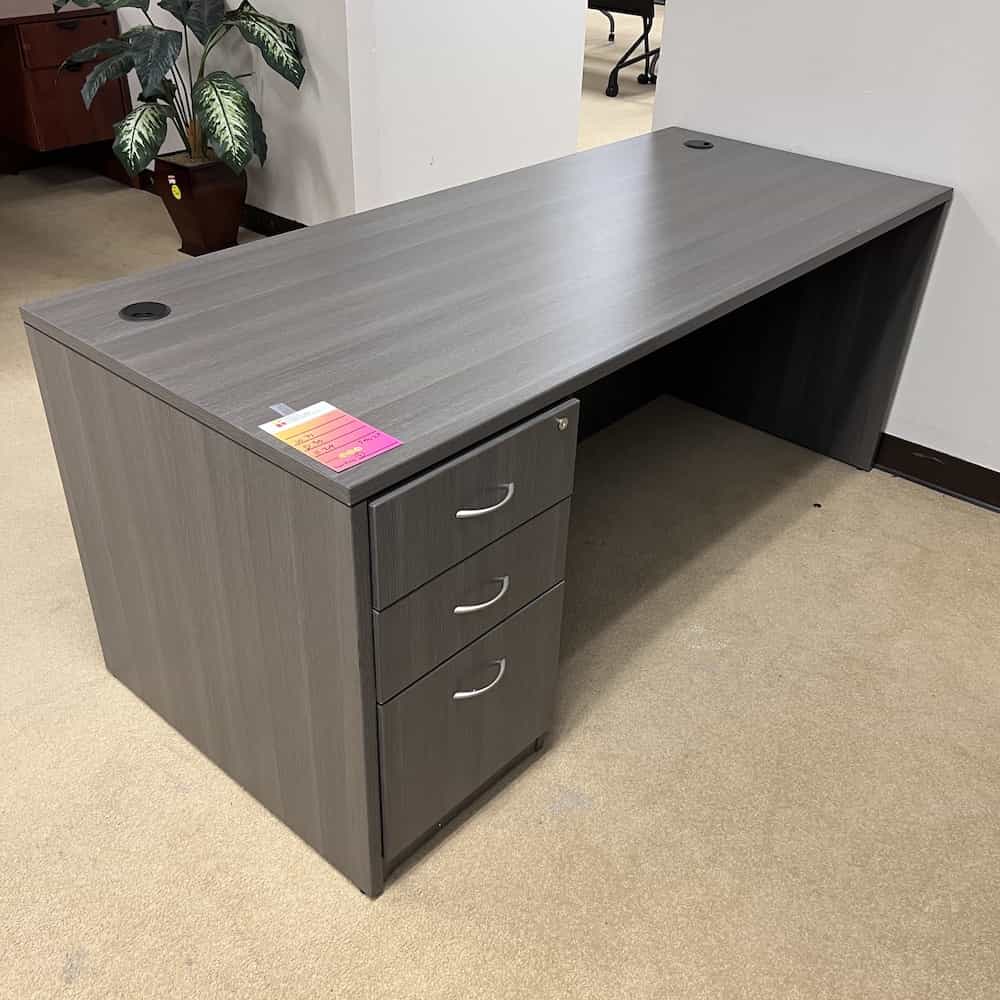 grey desk with one pedestal box box file