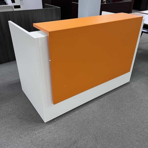 white and orange reception l-desk