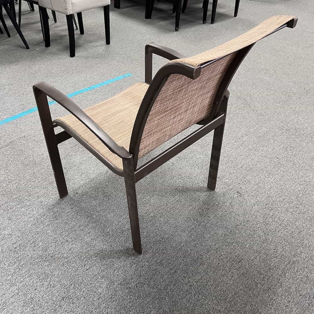 tan and metal brown stacking patio chair