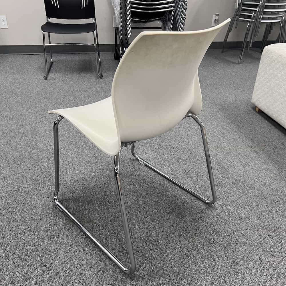 white stacking chair teknion chrome, back