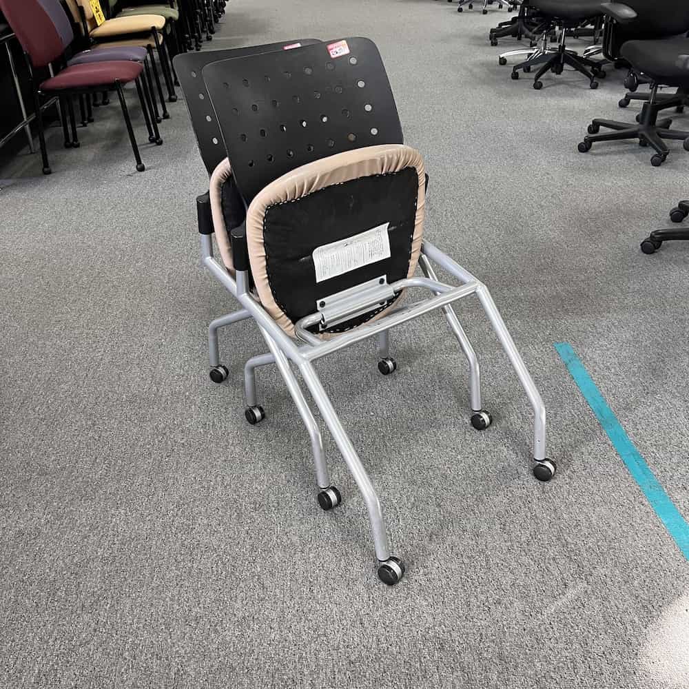 black and beige rolling nesting chair