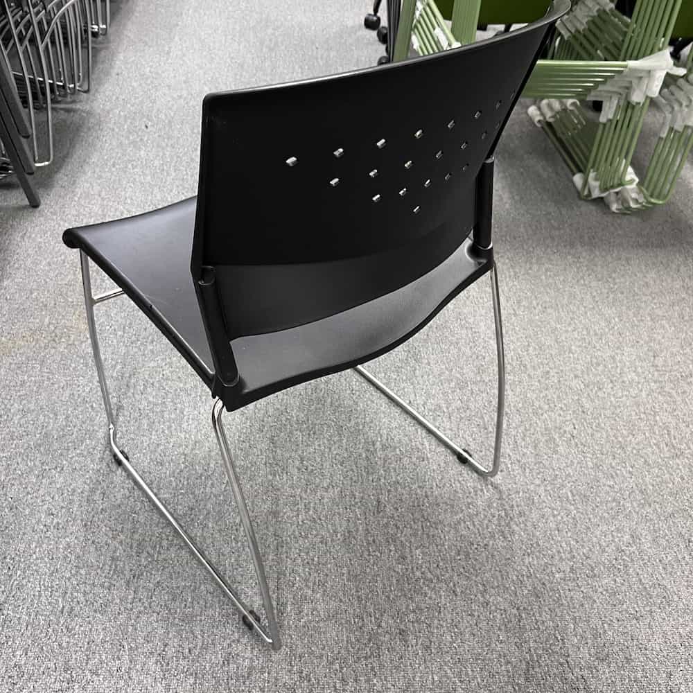 black plastic perforated back chrome legs stacking chairs