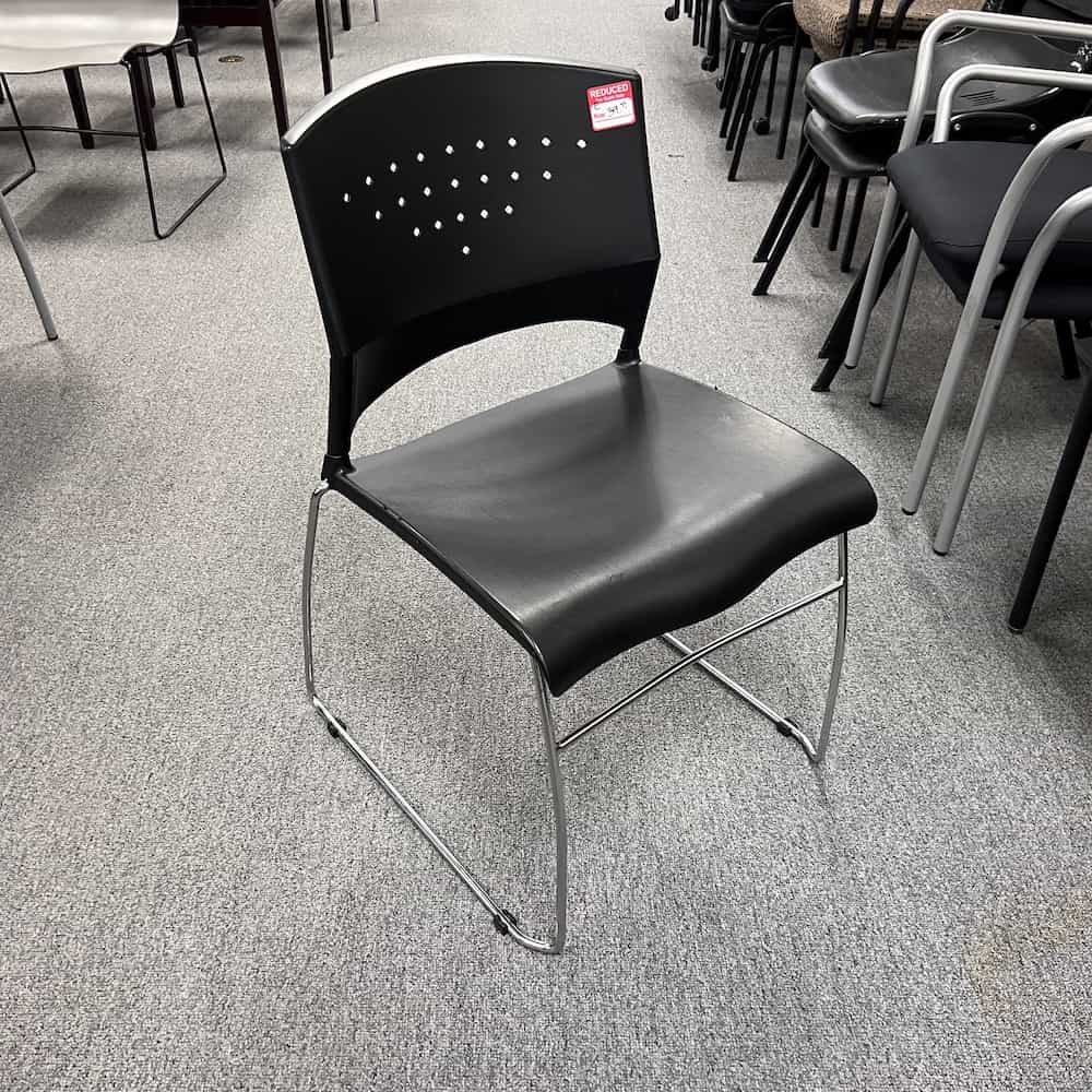 black plastic perforated back chrome legs stacking chairs