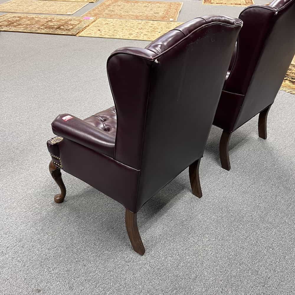 Wing Back Arm Chair, maroon burgundy vinyl with brass nail heads and walnut legs