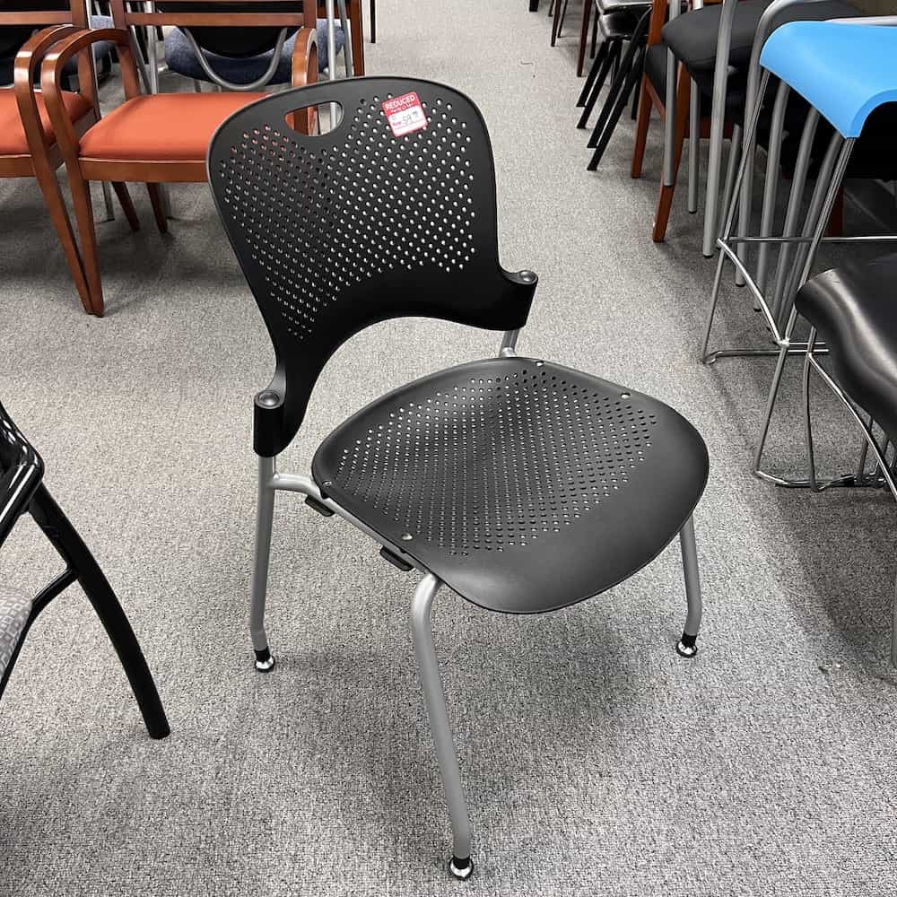 black and silver herman miller caper stacking chair