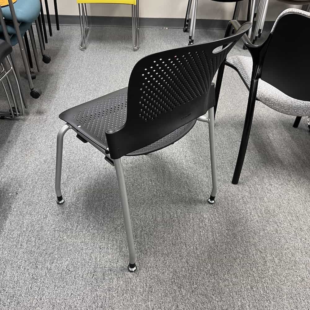 black and silver herman miller caper stacking chair