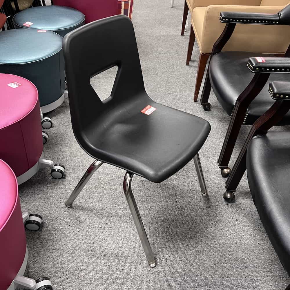 black plastic student seat stacking with chrome legs and triangle opening in back